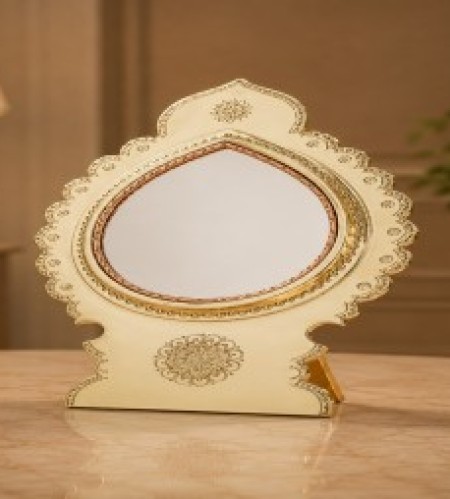  7.7CM | Perfect for Home Decor and Gifting Traditional Products Product ID : 18  WhatsApp Enquiry Elegant Round Aranmula Kannadi with Back Stand – 4 Inch Mirror Size Elegant Round Aranmula Kannadi with Back Stand – 4 Inch Mirror Size